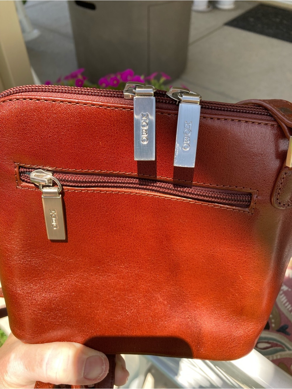 HOBO Leather Crossbody rich cognac leather color with Silver Hardware